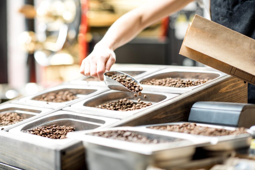 getting coffee beans from the tray 2021 12 13 23 15 34 utc
